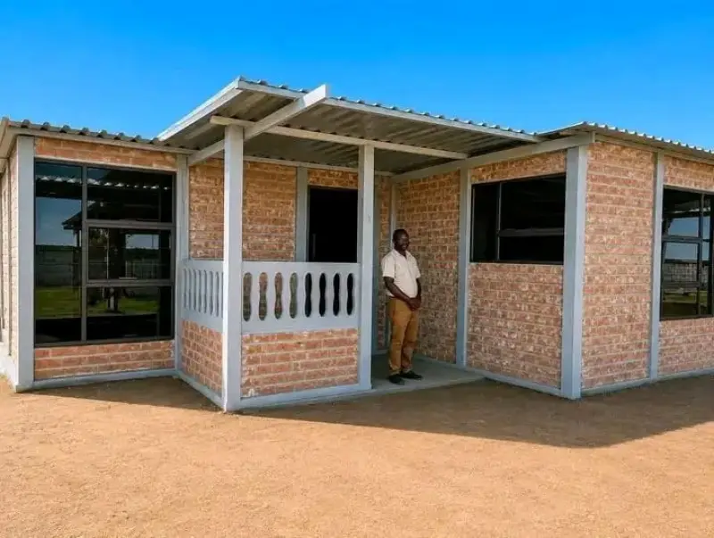 Brick-clad precast house with covered veranda